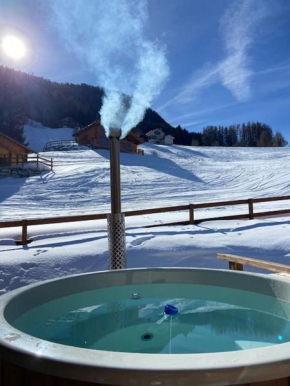 Ski in out Swiss Alps Chalet Charelle by Jolidi